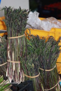 Tempting bundles of asparagus in an Italian market.